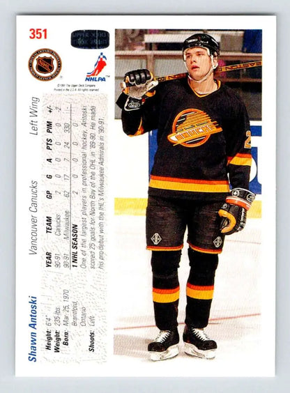 Hockey player in black Vancouver Canucks jersey on Shawn Antoski Upper Deck card