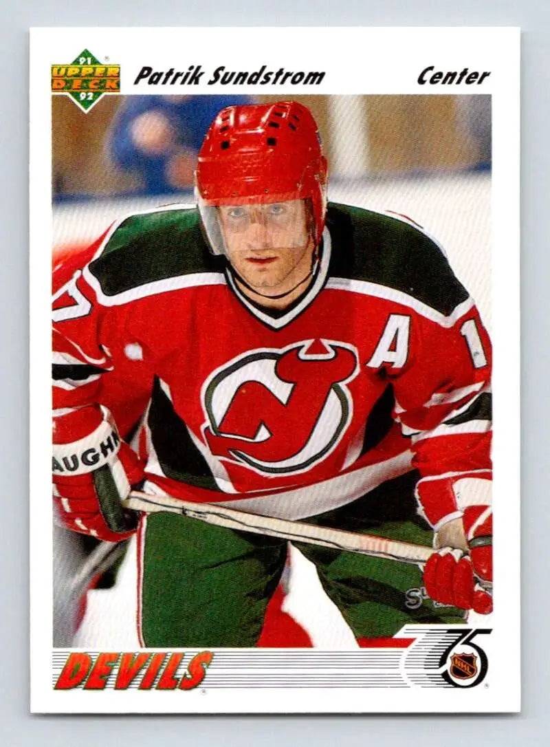 Hockey player in red New Jersey Devils jersey A, featured on Patrik Sundstrom hockey card