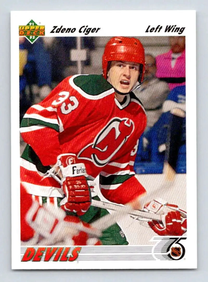 Hockey player in red New Jersey Devils jersey #23 showcasing Zdeno Ciger hockey card