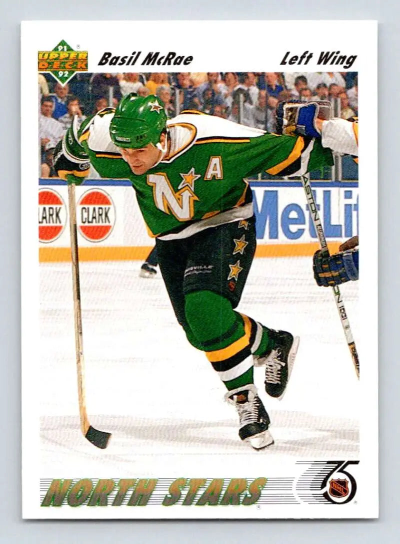 Hockey player wearing a green Minnesota North Stars jersey in action, Basil McRae