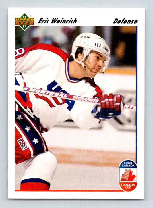 Hockey player in white jersey skating on ice, featured in Eric Weinrich Upper Deck card