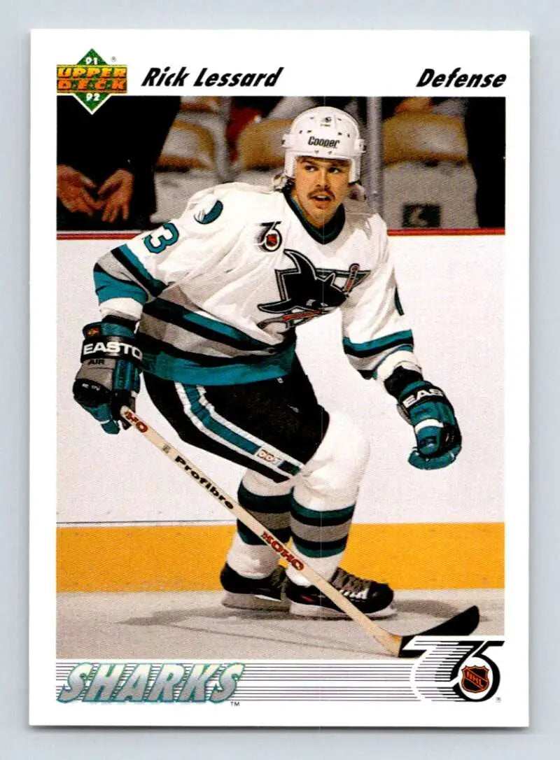 Hockey player in white San Jose Sharks jersey on ice for 1991-92 Upper Deck card