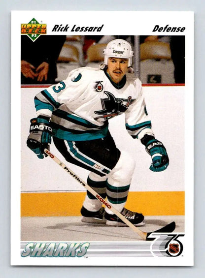 Hockey player in white San Jose Sharks jersey on ice for 1991-92 Upper Deck card