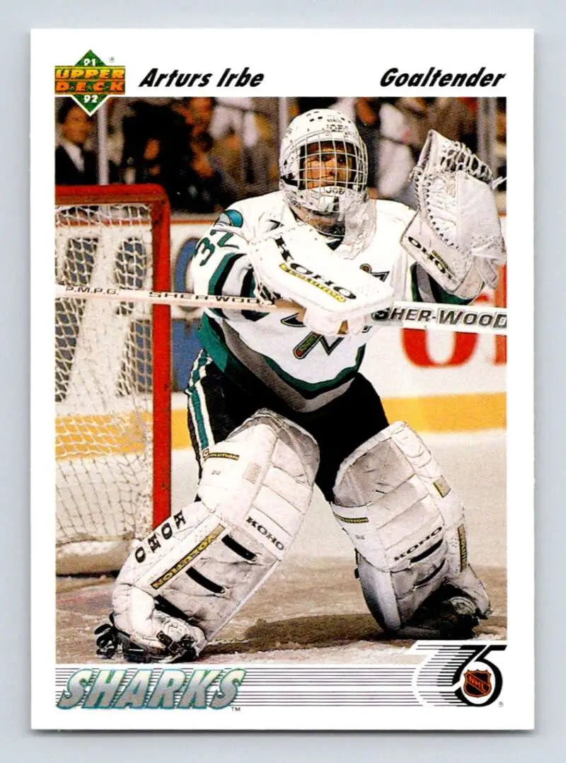 Hockey goalie Arturs Irbe in San Jose Sharks white and teal uniform gear