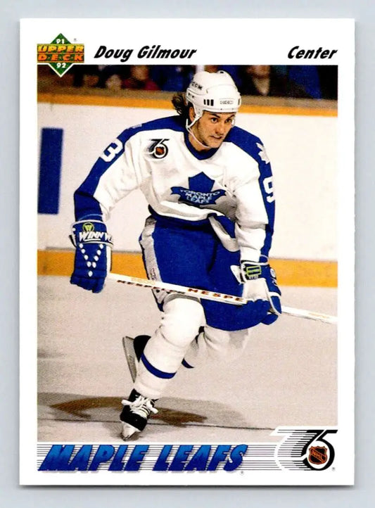 Hockey player in Toronto Maple Leafs uniform on ice, featuring Doug Gilmour