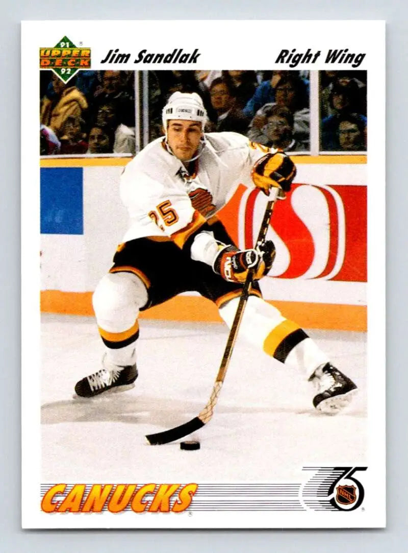 Hockey player in white Vancouver Canucks jersey controlling puck for Jim Sandlak card