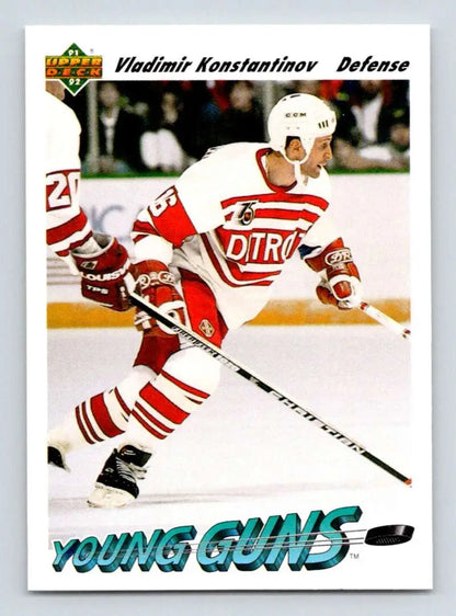 Hockey player in red and white uniform skating, representing Detroit Red Wings Upper Deck