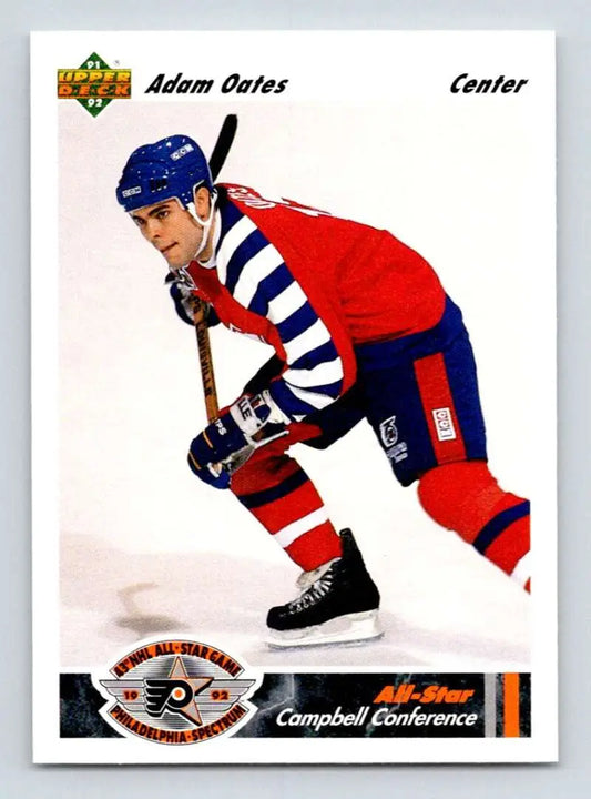 Hockey player in red, white, and blue uniform skating for Adam Oates Louis Blues hockey card