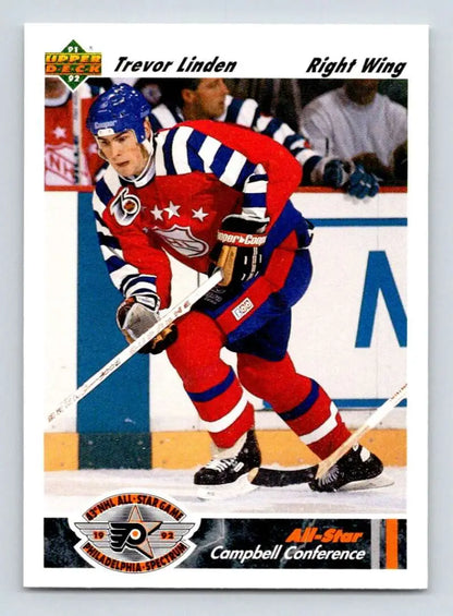 Hockey player in red, white, and blue uniform representing Vancouver Canucks