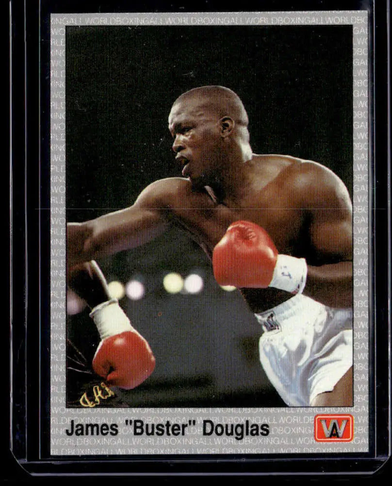 Boxing trading card of James Buster Douglas in fighting stance with red gloves and white shorts