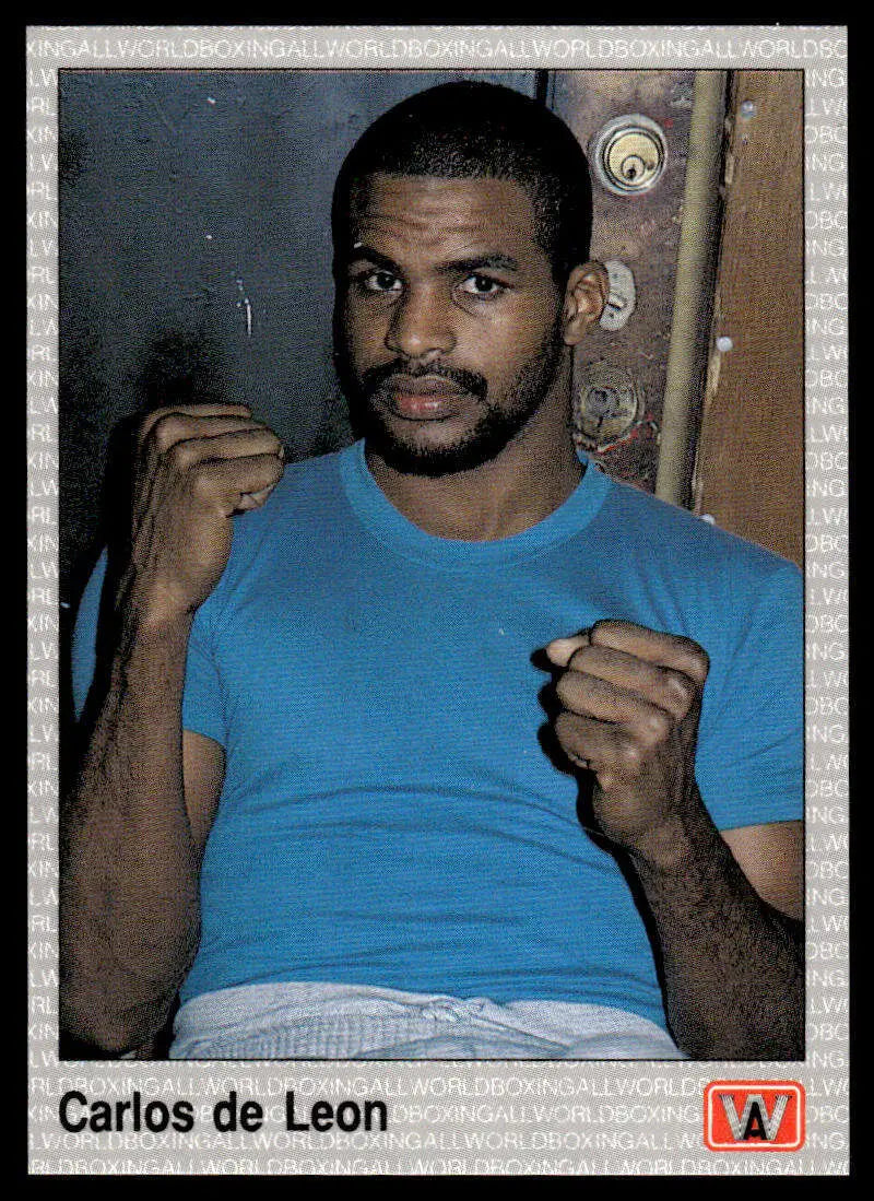 Boxer in blue t-shirt with fists raised for 1991 NM-MT Carlos De Leon boxing card