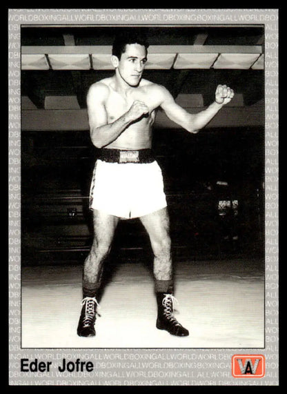 Black and white image of Eder Jofre in fighting stance for boxing card display