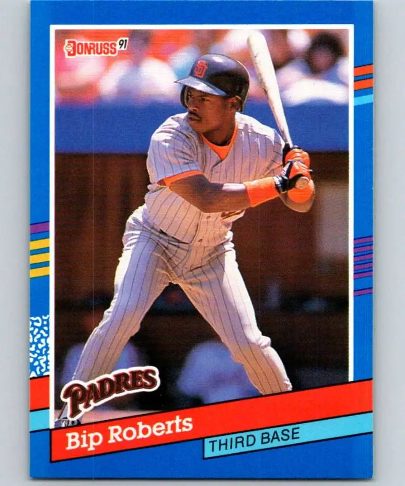 1991 Donruss Bip Roberts Padres Baseball Card featuring player in pinstriped uniform at bat