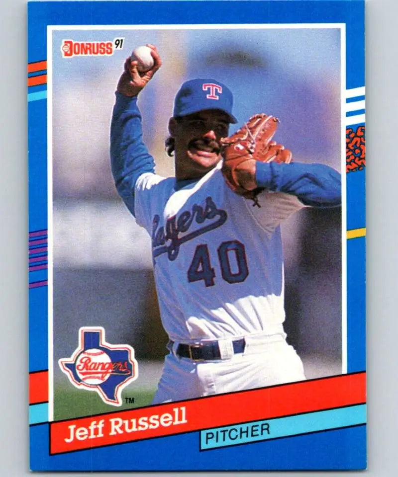 1991 Donruss baseball card of Jeff Russell, Texas Rangers pitcher in throwing motion