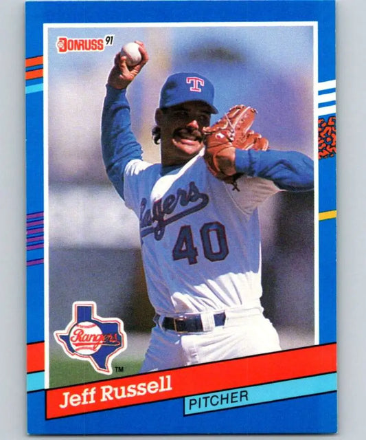 1991 Donruss baseball card of Jeff Russell, Texas Rangers pitcher in throwing motion