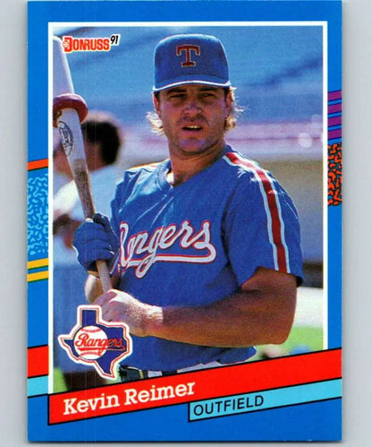 1991 Donruss Kevin Reimer baseball card featuring Texas Rangers outfielder in blue uniform