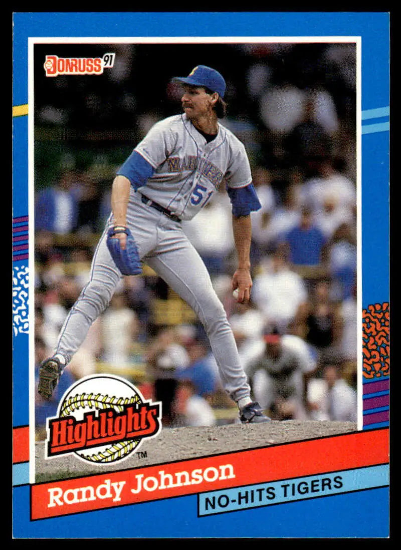 Randy Johnson Seattle Mariners baseball card showing the pitcher mid-delivery in uniform