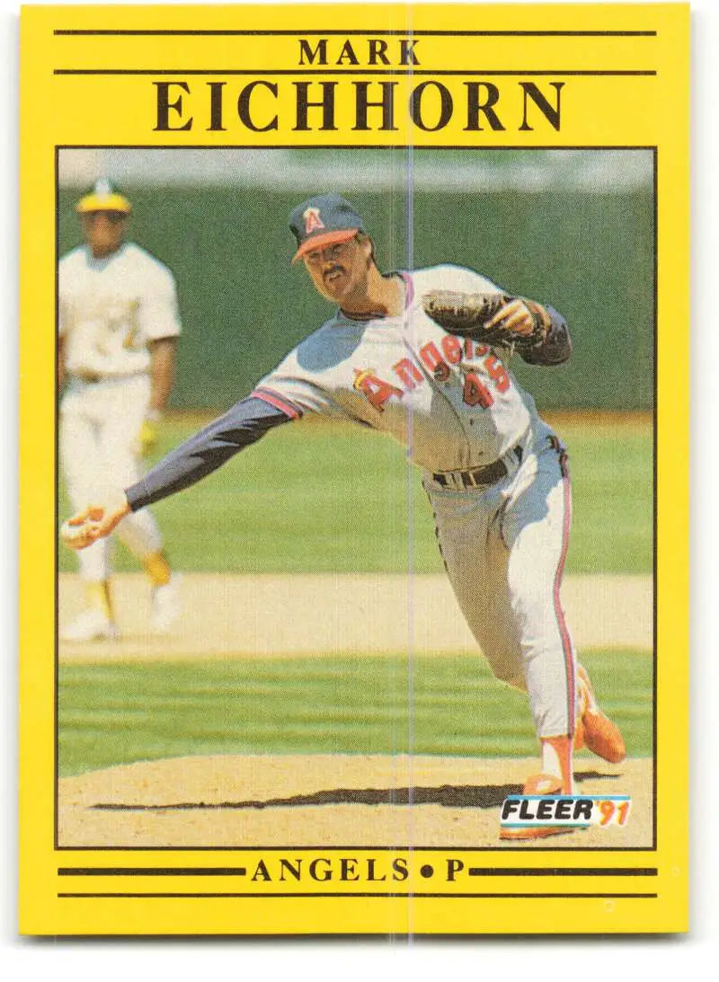 Yellow-bordered baseball card of Mark Eichhorn pitching for California Angels