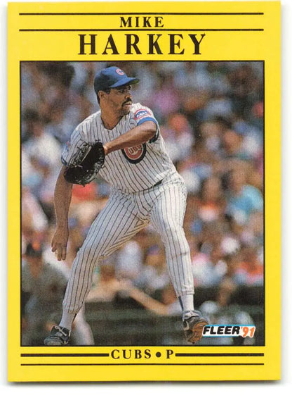 Yellow-bordered baseball card of Mike Harkey pitching for the Chicago Cubs