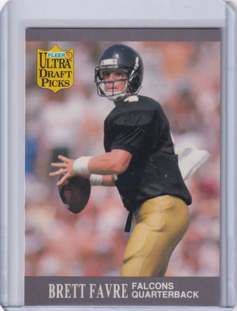 Football trading card of Brett Farve Atlanta Falcons in black jersey and gold pants