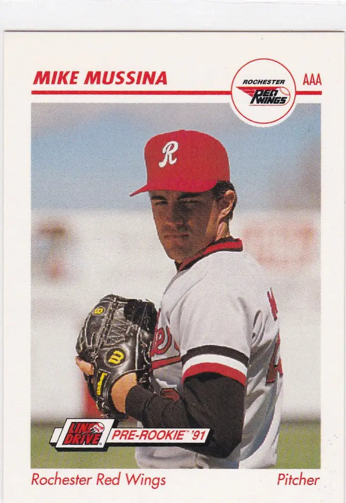 Baseball card of Mike Mussina for Rochester Red Wings in red cap and white uniform