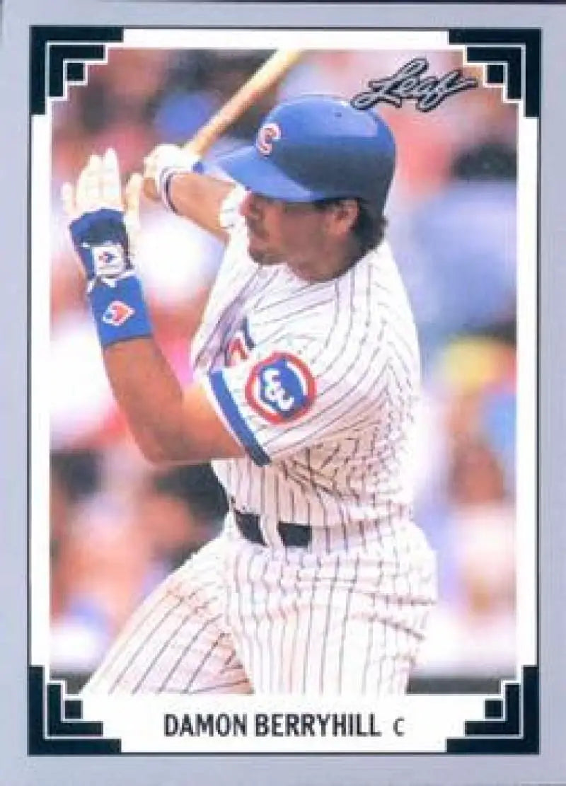 Baseball card of Damon Berryhill in pinstriped Chicago Cubs uniform at bat