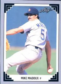 Baseball card of Mike Maddux in white uniform for San Diego Padres mid-throw