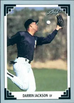 Baseball player Darrin Jackson in pinstriped uniform catching ball for San Diego Padres baseball card