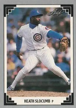 Heathcliff Slocumb Chicago Cubs baseball card in pinstripe uniform mid-delivery