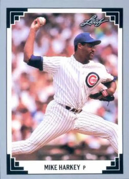 Mike Harkey delivering a pitch in Chicago Cubs pinstripe uniform on baseball card