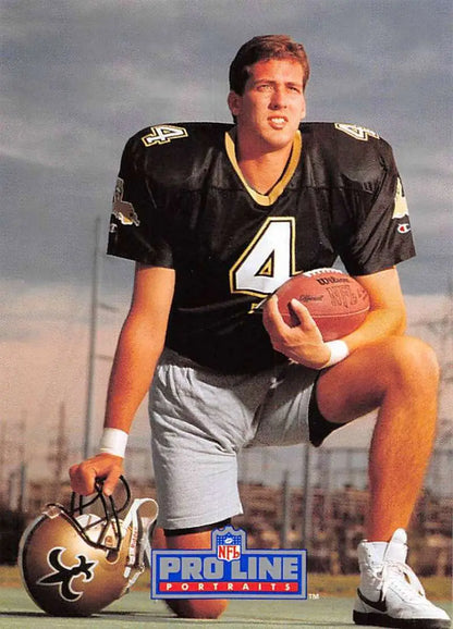 Steve Walsh in black #4 jersey with football and helmet for Pro Line Portraits card