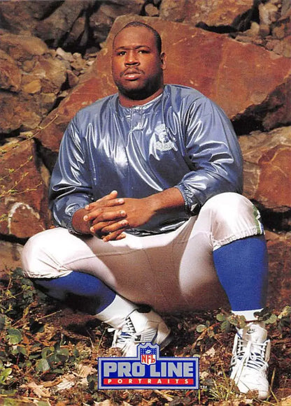 NFL player in Detroit Lions uniform on rocks for Cortez Kennedy Pro Line Portraits card