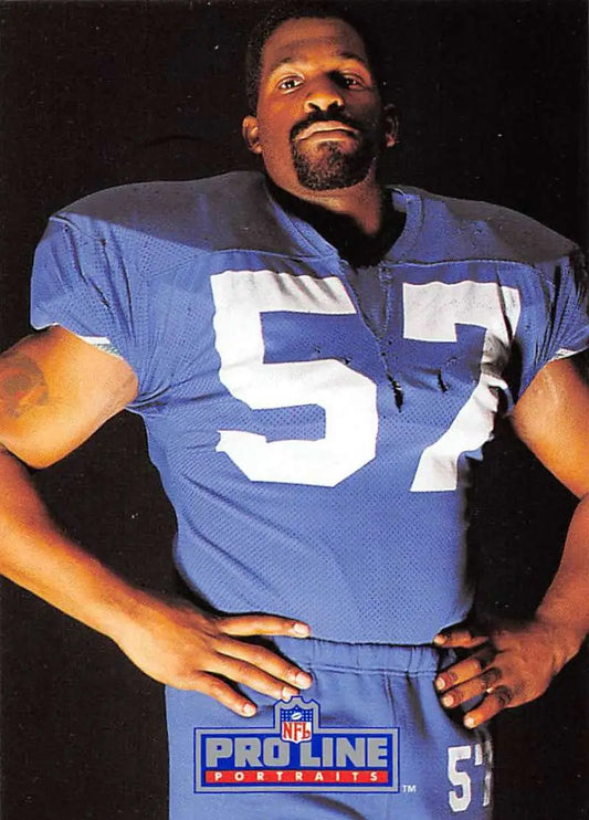 NFL player in blue jersey 57, featured in 1991 Pro Line Portraits Tony Woods Seattle Seahawks Card