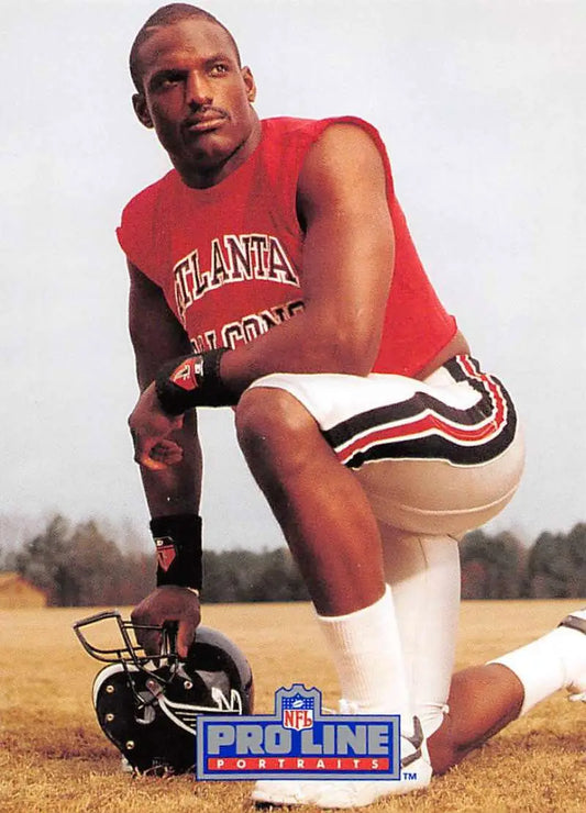 Keith Jones in Atlanta Falcons uniform kneeling with helmet on football card