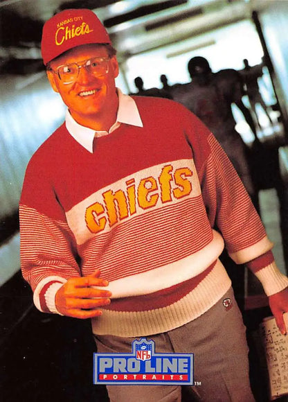 Red and white Kansas City Chiefs sweater and cap featuring Marty Schottenheimer