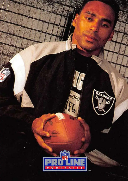 NFL Pro Line image featuring Roger Craig with a Los Angeles Raiders jacket and football