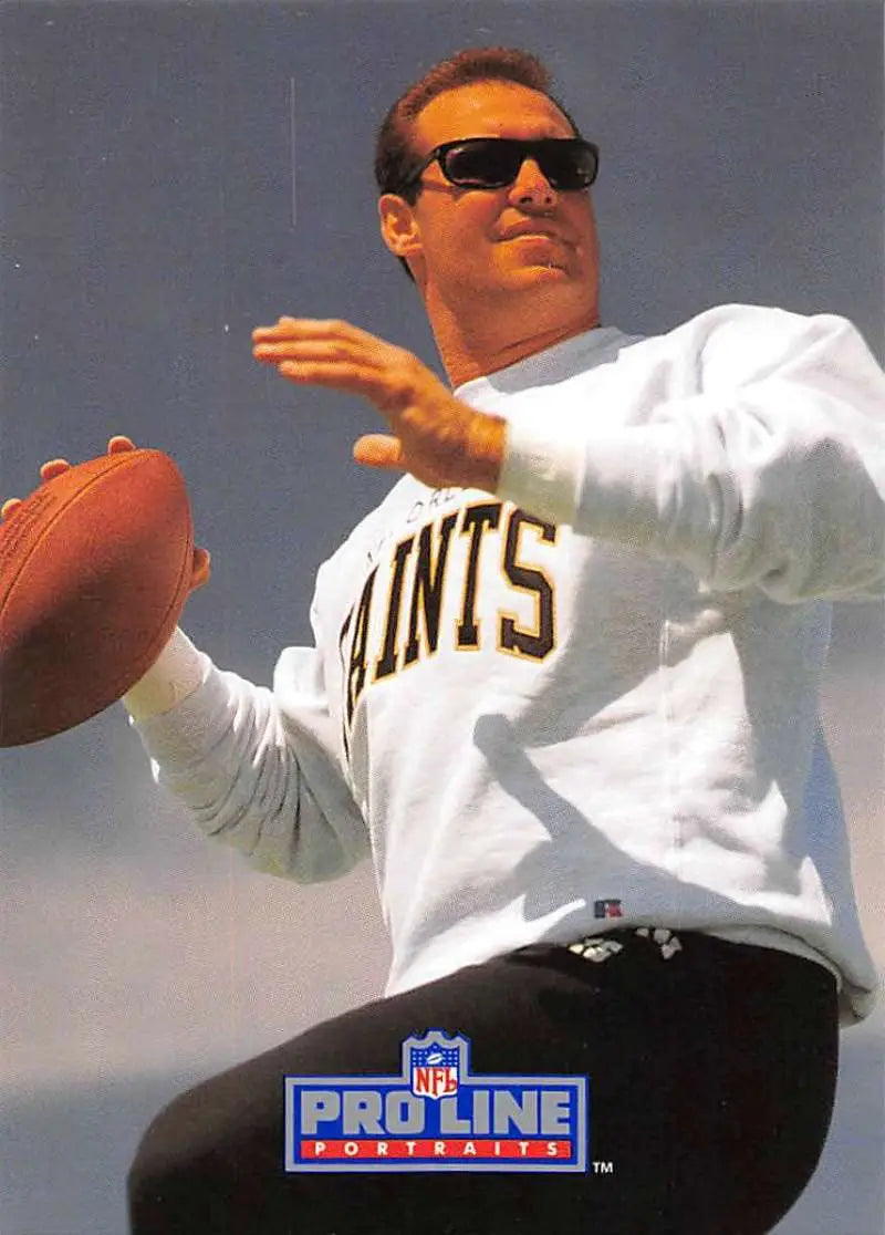 John Fourcade in sunglasses, Giants sweatshirt, ready to throw a football for Pro Line