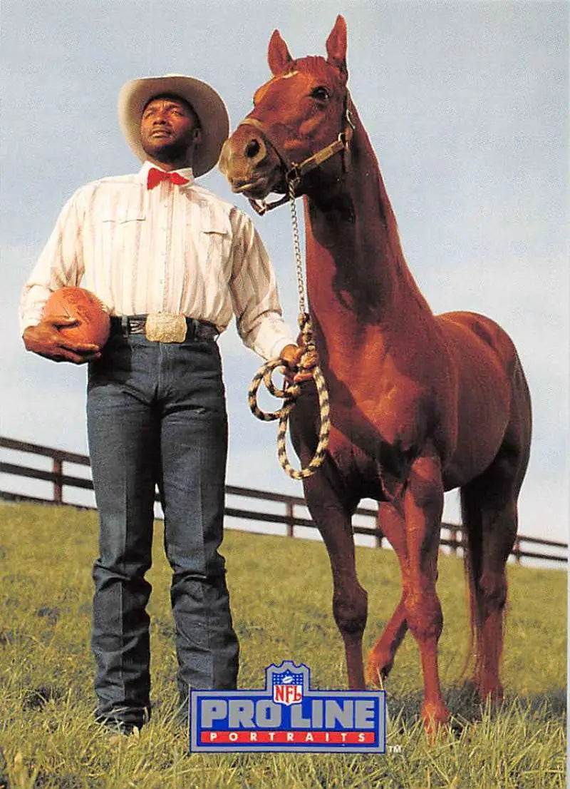 Person in western attire next to a chestnut horse from Pro Line Portraits Mel Blount