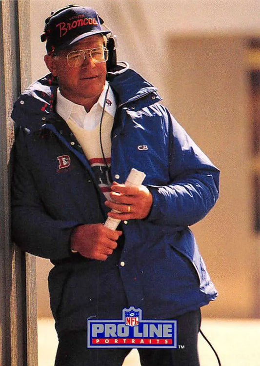 NFL coach Dan Reeves in a blue jacket and Broncos cap, featured in Pro Line Portraits