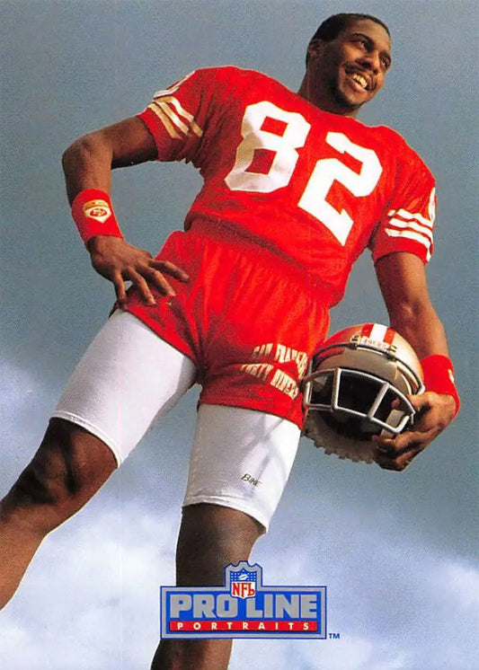 Football player in red #82 jersey holding a football for San Francisco 49ers John Taylor card