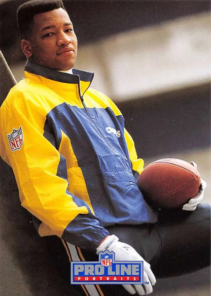 NFL Pro Line jacket in yellow and navy blue with football, featuring Martin Bayless Football Card