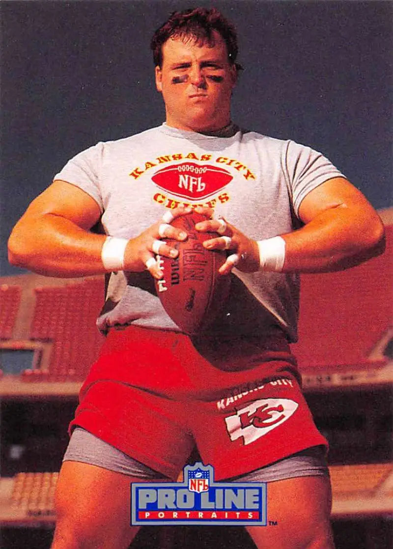 Tim Grunhard in Kansas City Chiefs uniform holding football for Pro Line Portraits card