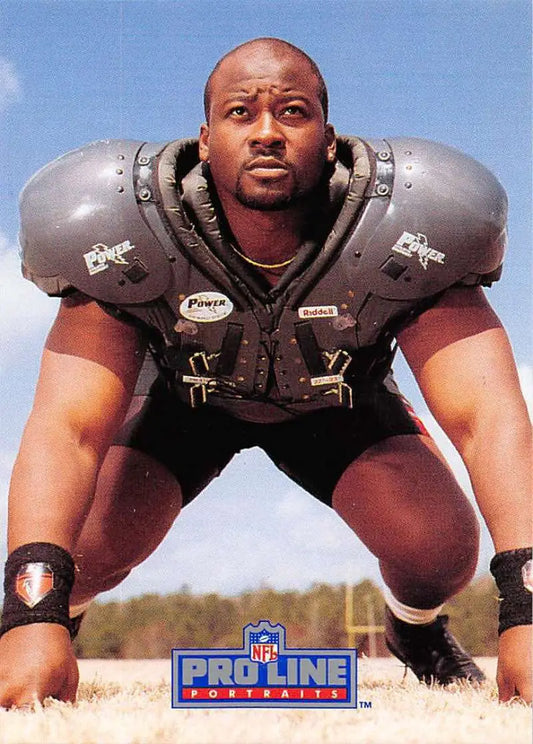 Football player Chris Hinton in protective pads for Atlanta Falcons football card