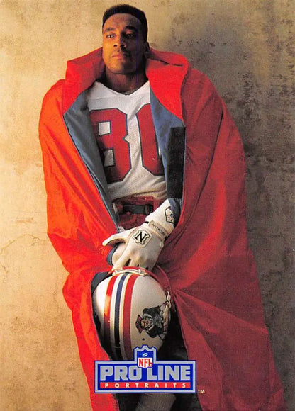 Football player in a red jacket holding a helmet for Pro Line Portraits New England Patriots card