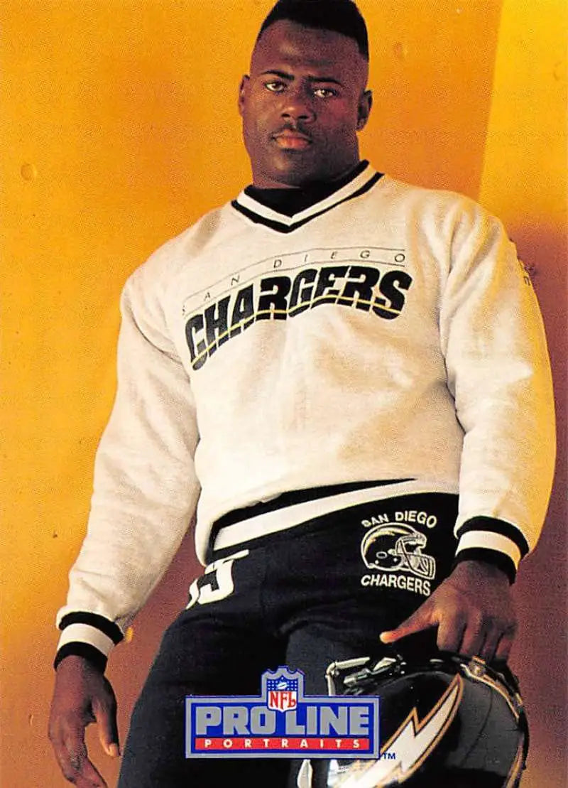 White Chargers NFL sweater with black trim and logo, featuring Marion Butts design