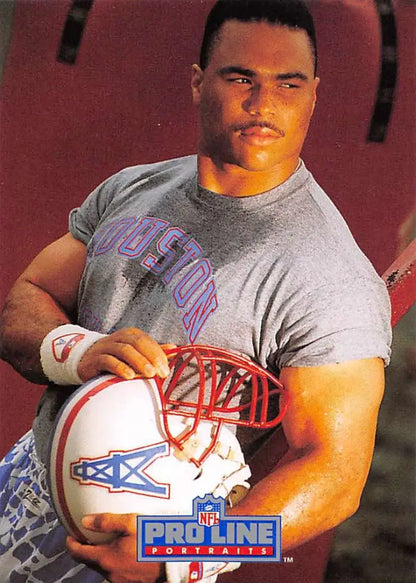 Professional football player in gray shirt with NFL helmet from Houston Oilers Pro Line Portraits