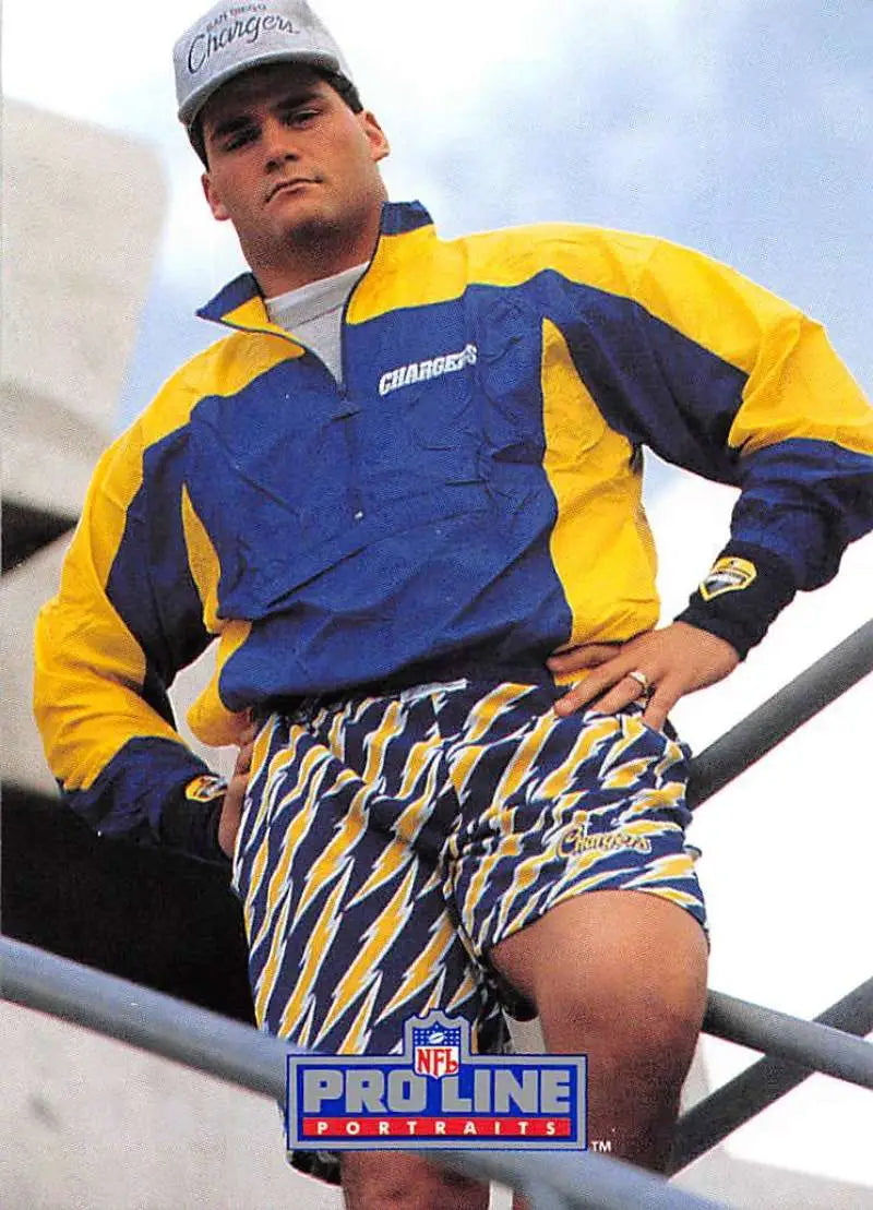 Person in yellow and blue windbreaker, patterned shorts from Burt Grossman Pro Line Portraits