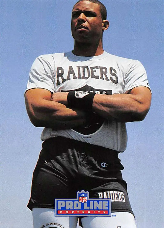 Person in Raiders t-shirt with blue sky for Nick Bell Pro Line Portraits card