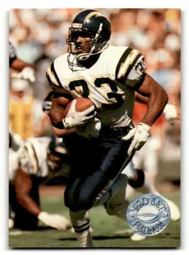 Football player Ronnie Harmon in action from 1991 Pro Set Platinum original gloss