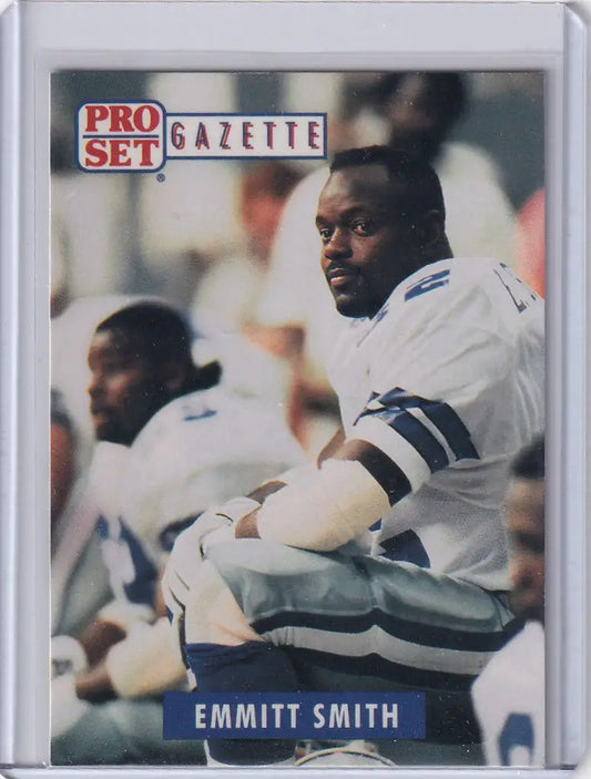 Football trading card of Emmitt Smith Dallas Cowboys in white and blue uniform